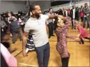  ?? JOHN ARMATO — FOR DIGITAL FIRST MEDIA ?? Dads and daughters spun the night away during last weeks Father Daughter Dance at Pottstown Middle School.