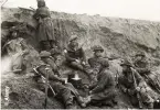  ?? ?? British soldiers cook a meal during the advance between the Rivers Maas and Rhine