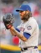  ?? Chris Coduto / Getty Images ?? Starting pitcher Trevor Williams of the Mets gave up four runs on seven hits over two innings against the Diamondbac­ks on Saturday.