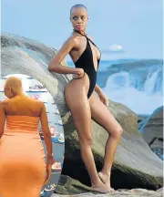  ?? Pictures: TWITTER ?? GETTING HER OWN BACK: Ntando Duma at the beach, above, and her digitally manipulate­d picture