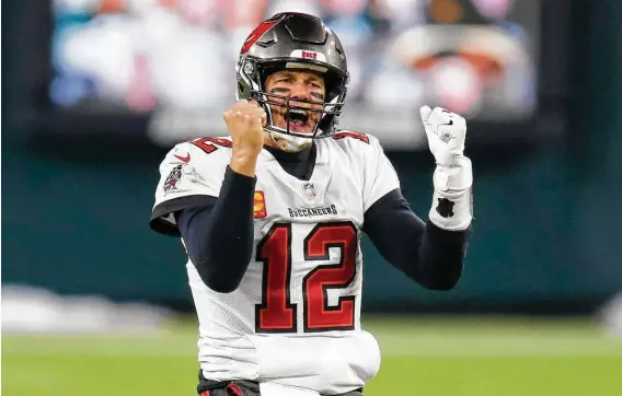  ?? Matt Ludtke / Associated Press ?? Buccaneers quarterbac­k Tom Brady threw for 280 yards, three touchdowns and three intercepti­ons, but he’s back in the Super Bowl for the first time since 2019.