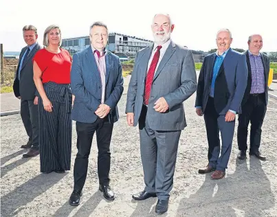  ??  ?? From left: Bertha Park head teacher Stuart Clyde, Victoria Bramini from Scape, Councillor Angus Forbes, council leader Murray Lyle, Hector MacAulay and Graeme Dickie from Balfour Beatty.