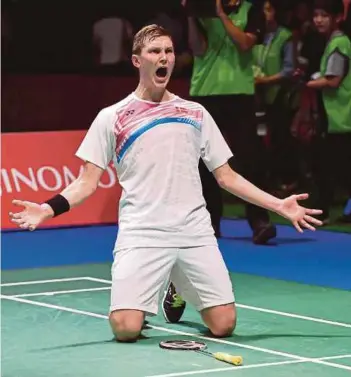  ?? AFP PIC ?? Viktor Axelsen celebrates after defeating Lee Chong Wei 21-14, 19-21, 21-14 in the men’s singles final at the Japan Open yesterday.