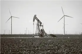  ?? Brandon Thibodeaux / New York Times file photo ?? Big Oil companies are developing wind and solar projects to prepare for what they expect will be a low-carbon future amid growing concerns about climate change.