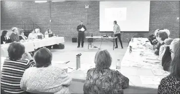  ?? TOWNSHIPPE­RS’ ASSOCIATIO­N ?? Attendees at the March Health Link session listen carefully as volunteer Jocelyn Lacroix and Dira-estrie project coordinato­r Marie-philippe Dubuc present informatio­n and advice about how to recognize, address, and prevent bullying amongst seniors.