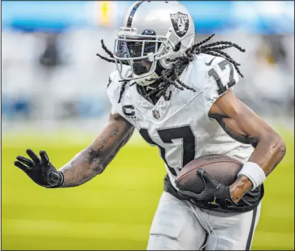 ?? Heidi Fang Las Vegas Review-journal @Heidifang ?? Raiders wide receiver Davante Adams had eight catches for 75 yards on Sunday.
