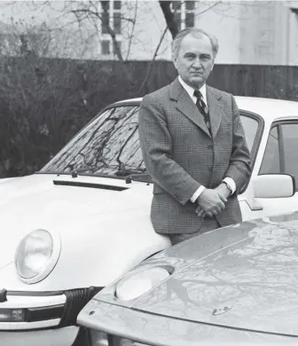  ??  ?? Above: Ernst Fuhrmann in 1978, alongside a new 928, the car some in Porsche believed would outlive the 911. However, despite popular belief, Fuhrmann was not ʻanti-911ʼ…