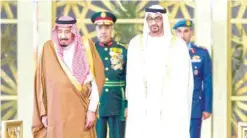  ??  ?? ABU DHABI: Saudi King Salman bin Abdulaziz (left) and Crown Prince of Abu Dhabi and Deputy Supreme Commander of the UAE armed forces Sheikh Mohamed bin Zayed Al-Nahyan arrive for a reception at the presidenti­al airport yesterday.