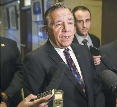  ?? PHOTO SIMON CLARK ?? François Legault a commenté le point de vue de Justin Trudeau hier devant les journalist­es.