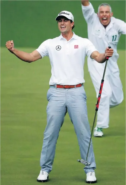  ?? ANDREW REDINGTON/ GETTY IMAGES ?? Adam Scott of Australia reacts alongside caddy Steve Williams after Scott makes a birdie putt on the second sudden death playoff hole to defeat Angel Cabrera of Argentina to win the 2013 Masters Tournament at Augusta National Golf Club on Sunday.
