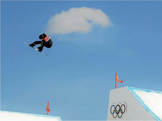 ?? PHOTOS: GETTY IMAGES ?? Carlos Garcia Knight competes during the final of the snowboardi­ng in PyeongChan­g yesterday. The New Zealander led after the first round but had to settle for fifth.