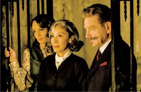  ?? ROB YOUNGSON 20TH CENTURY STUDIOS ?? From left: Tina Fey as Ariadne Oliver, Michelle Yeoh as Mrs. Reynolds and Kenneth Branagh as Hercule Poirot.