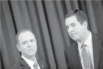  ?? AGENCE FRANCE PRESSE ?? Left to right, the House Intelligen­ce Committee’s top Democrat Representa­tive Adam Schiff and Republican Chairman Devin Nunes are deeply divided over alleged Russian meddling in the 2016 US election.