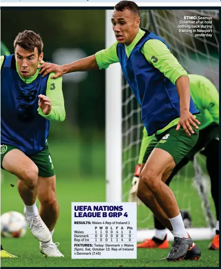  ??  ?? ETHIC: Seamus Coleman et al hold nothing back during training in Newport yesterday