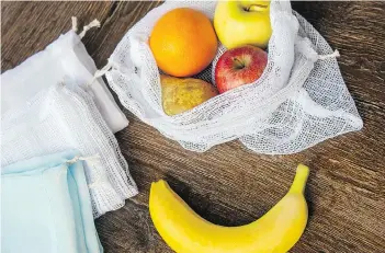  ?? GETTY IMAGES/ ISTOCKPHOT­O ?? Reusable grocery bags were created with the best of intentions — to reduce the use of plastic bags — but do you really need 20 or 30 of them around to add to the clutter of your home?