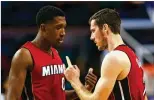  ?? MADDIE MEYER / GETTY IMAGES ?? Goran Dragic (right, with Josh Richardson) earned his first All-Star berth by leading the Heat in scoring average (17.3 points).