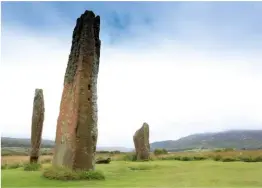  ??  ?? ▲ STONE AGE SURVIVORS
Above: Only three pillars of Machrie Moor 2 still stand. The tallest is 16 feet high. Nearby, a fallen slab was hewn into millstones in the 1700s, but never removed.