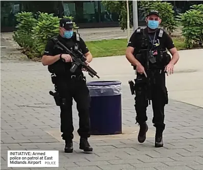  ?? POLICE ?? INITIATIVE: Armed police on patrol at East Midlands Airport