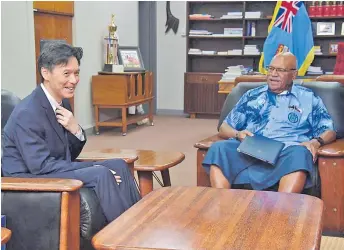  ?? Picture: FIJI GOVERNMENT ?? Ambassador Michii with the Honourable Prime Minister.