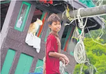  ??  ?? BELOW
A local boy works on a fishing boat in the Myeik Archipelag­o. Overfishin­g has reduced catches for local fishing communitie­s.