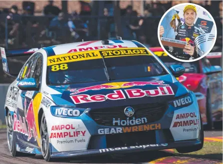  ??  ?? Jamie Whincup drives to victory at Hidden Valley in Darwin and (inset) shows off the spoils.
Pictures: GETTY IMAGES