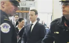  ??  ?? 0 Mark Zuckerberg arrives at Capitol Hill to testify