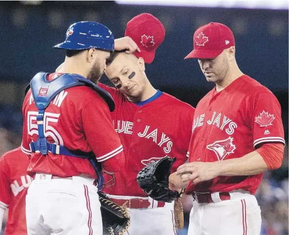  ?? — CP FILES ?? From left, Blue Jays stars Russell Martin, Troy Tulowitzki and J.A. Happ are all part of the team’s US$90 million worth of talent sitting on the disabled list. A dozen Jays have been placed on the DL already this year, costing the team more than 300...