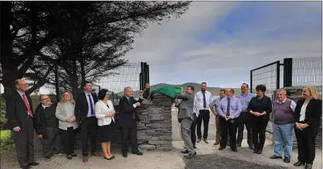  ?? Photos by Valerie O’Sullivan. ?? Mayor of Kerry Cllr John Sheahan and Joe Kennedy of Irish Water unveil the plaque at the official opening of the new Waste Water Treatment facility at Valentia.