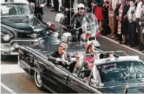  ?? Newseum via Associted Press ?? In this Nov. 22, 1963 photo, President John F. Kennedy’s motorcade travels in Dallas. On Saturday, President Donald Trump said he would allow the release of assassinat­ion files.