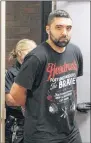  ?? TARA BRADBURY/THE TELEGRAM ?? Cédrick Leblond, 31, is brought into provincial court in St. John’s Wednesday, having been arrested by RNC officers at a St. John’s hotel the day before. Leblond was the subject of a Canada-wide arrest warrant, sought on aggravated assault charges...