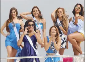  ?? EDD GUMBAN ?? File photo shows Miss Universe candidates Cherell Williamson of Bahamas, Flavia Brito of Portugal, Carolina Duran of Costa Rica, Rebecca Rath of Belize, Chanelle de Lau of Curacao, and Hildur Maria of Iceland aboard a vessel that will take them to Pico...