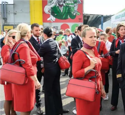  ?? © ?? Piloten en cabinepers­oneel van Brussels Airlines protestere­n tegen de hoge werkdruk.
Bart Dewaele