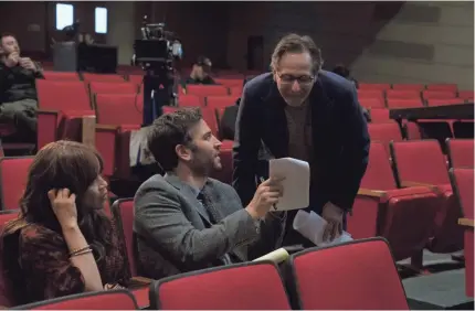  ?? PHOTOS BY VIRGINIA SHERWOOD/NBC ?? Executive producer Jason Katims, right, works with stars Rosie Perez and Josh Radnor.