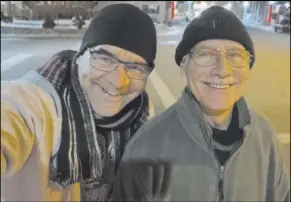  ?? John Katsilomet­es Las Vegas Review-Journal @JohnnyKats ?? John Katsilomet­es and his father, George, in a selfie taken in downtown Lava Hot Springs, Idaho, on John’s annual holiday trip.