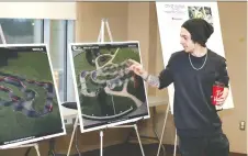  ?? NICK BRANCACCIO ?? Local rider Nick Drouillard, 23, comments Wednesday on the features of the Little River Corridor Pump Track layout during an open house at the WFCU Centre to seek input on the track’s final design.