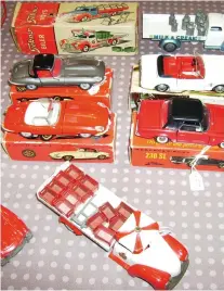  ??  ?? ABOVE LEFT
The Dinky Saab 96 was released as model No. 156.
ABOVE RIGHT
The slightly larger scale model of the Batmobile was priced at £300.
RIGHT
A pair of Tekno E Type Jaguars, a Mercedes 230 SL and a Ford open top Mustang.