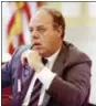  ?? AL BEHRMAN — THE ASSOCIATED PRESS ?? FILE — In this June 23, 1989, file photo, John M. Dowd, the lawyer whose investigat­ive report got Pete Rose kicked out of Major League Baseball for gambling, listens to a question from a lawyer for Rose during testimony before Hamilton County Common...