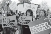  ?? JOSE LUIS MAGANA AP ?? Demonstrat­ors protest outside of the U.S. Supreme Court Tuesday, May 3, 2022 in Washington.