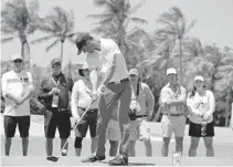  ?? BRYNN ANDERSON/AP ?? Austin Eckroat, of the U.S. team, hits his tee shot on the third hole in the singles matches during the Walker Cup on Sunday at Seminole Golf Club in Juno Beach.