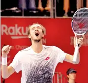  ?? — AP ?? Russia’s Daniil Medvedev celebrates his 6-2, 6-4 win over Kei Nishikori of Japan in their Japan Open final in Tokyo on Sunday.