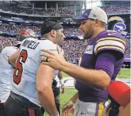  ?? BRUCE KLUCKHOHN/ AP ?? Buccaneers quarterbac­k Baker Mayfield ( 6) and Vikings quarterbac­k Kirk Cousins ( 8) might be options to consider in a trade.