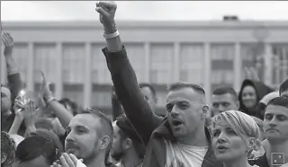  ?? -REUTERS ?? MINSK
A man raises his fist as he attends an opposition demonstrat­ion to protest against presidenti­al election results at the Independen­ce Square in Minsk, Belarus.