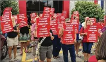  ?? CONTRIBUTE­D ?? Dayton Education Associatio­n members Tuesday protested the lack of a new contract with Dayton Public Schools. Teachers have authorized a strike if a deal is not reached by Aug. 11.