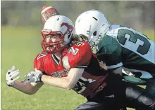  ?? CLIFFORD SKARSTEDT EXAMINER ?? Crestwood Mustangs' Oliver Hazelwood misses a pass against Adam Scott Lions' Isaac Clark.