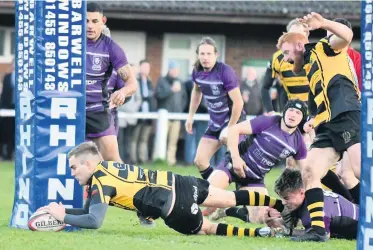  ??  ?? Hinckley RFC’s Joe Glover scoring the first of his two tries. Picture: Steve Wells