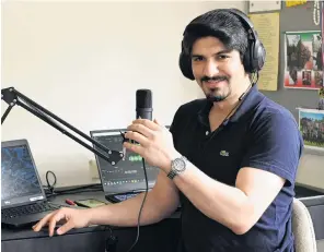 ?? PHOTO: LINDA ROBERTSON ?? Making records . . . Radio presenter Amir Amini, of Dunedin, prepares another broadcast for Radio Toranj, which has been named a finalist in the New Zealand Radio Awards.
