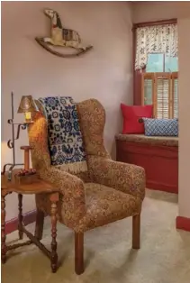  ??  ?? Left: Terri sewed the valance and window-seat cushion that cozy up this corner of the bedroom. By introducin­g a wing chair, table and lamp to the space, she formed a lovely resting area.