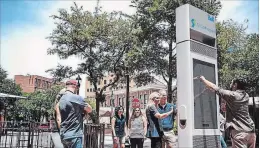  ?? SPECIAL TO THE ST. CATHARINES STANDARD ?? An illustrati­on of a smart kiosk that Bell will install in St. Catharines as part of a pilot partnershi­p with the city. The kiosk will offer free Wi-Fi, USB charging ports, 911 emergency call buttons and more.