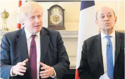  ??  ?? Boris Johnson with French Foreign Minister Jean-Yves Le Drian