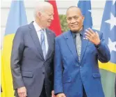  ?? Picture: REUTERS ?? US President Joe Biden chats with President of Kiribati Taneti Maamau.